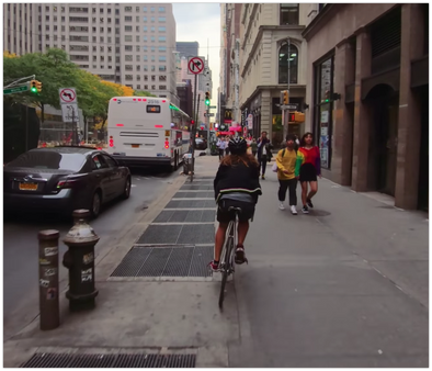 Mesmerizing clip of a cyclist cutting through traffic in NYC