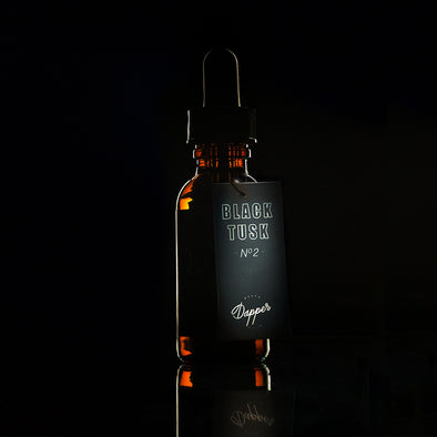 Black Tusk No. 2 - Sleek amber bottle with precision dropper